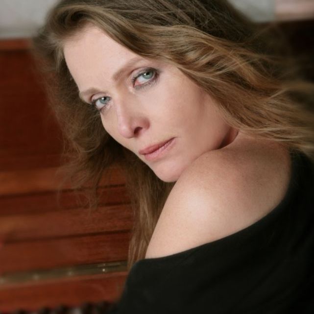 Merete Van Kamp black colour photo